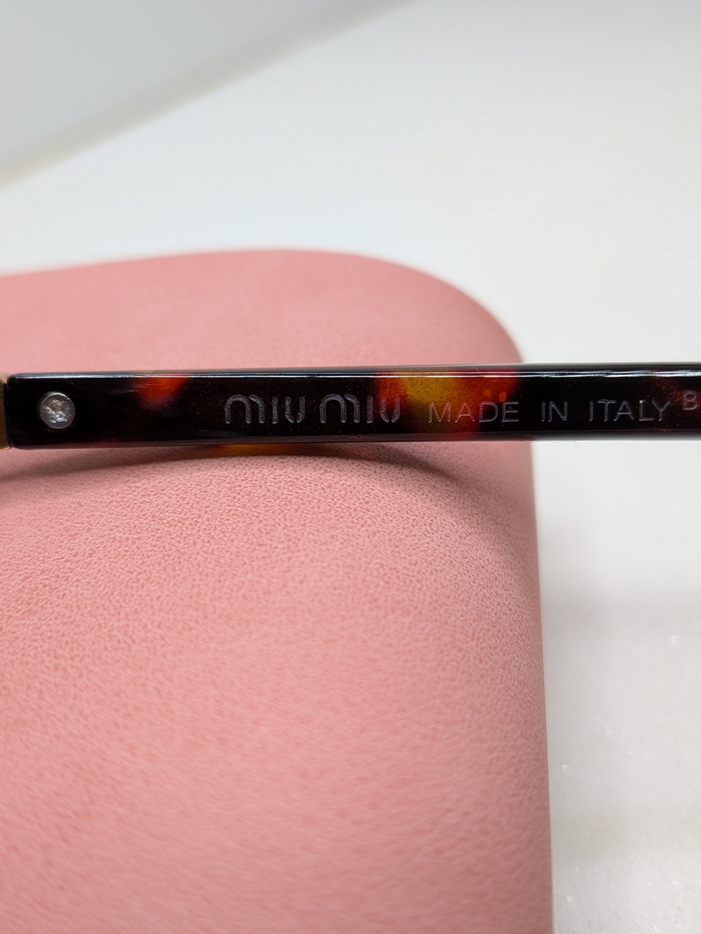 Miu Miu Tortoiseshell Oval Sunglasses in Brown - Picture 8 of 11